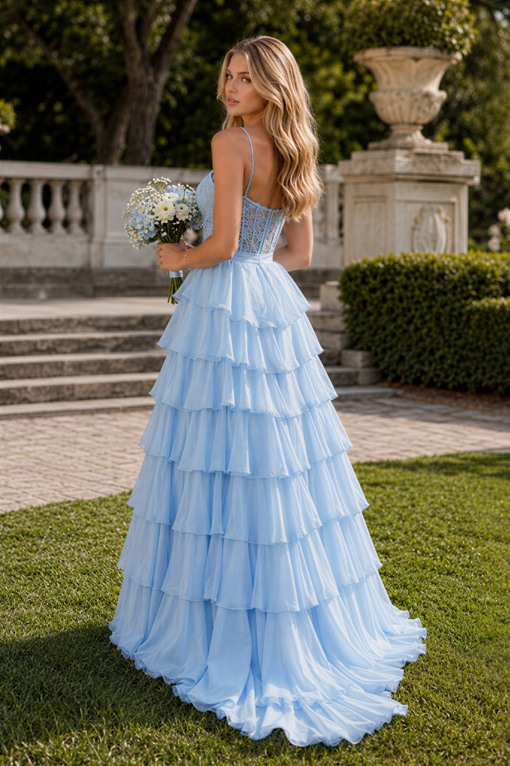 Light blue chiffon A-line prom gown with ruffles and lace appliques