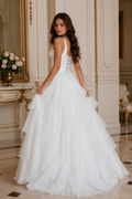 White A-line ruffle chiffon prom dress with side slit and lace-up back
