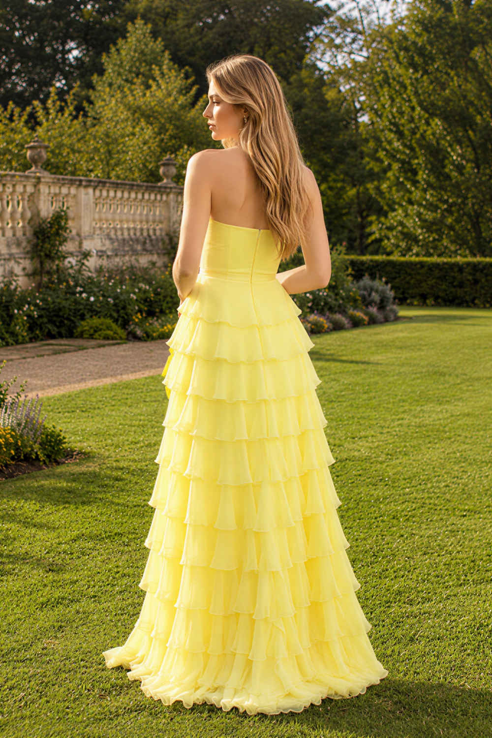 Yellow chiffon A-line tiered strapless prom dress
